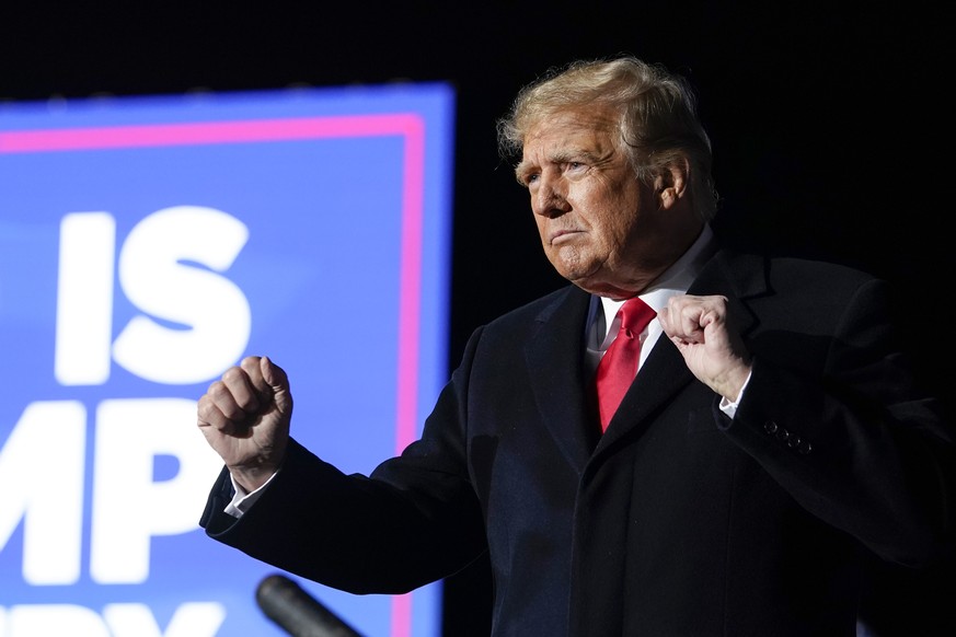 Former President Donald Trump dances after he finished speaking at a campaign rally in support of the campaign of Ohio Senate candidate JD Vance at Wright Bros. Aero Inc. at Dayton International Airpo ...