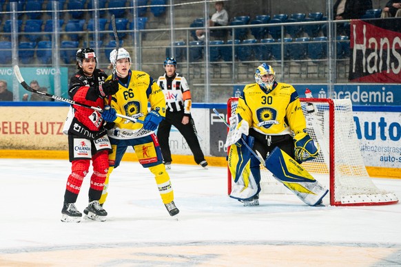 Basel, Switzerland, October 04th 2025: Supinski Brett EHC Basel and Tim Minder, Perrin Loic EHC Arosa after the the SKY SWISS LEAGUE Ice hockey, Eishockey game between EHC Basel and EHC Arosa at St. J ...