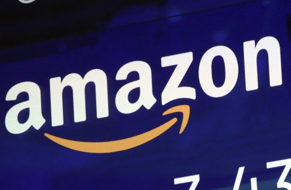 FILE - The logo for Amazon is displayed on a screen at the Nasdaq MarketSite, in New York, , July 27, 2018. Congress has taken a new step toward reining in the market dominance of Big Tech. Bipartisan ...