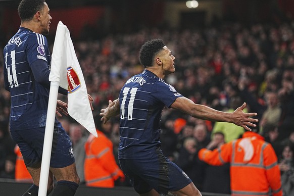 Aston Villa&#039;s Ollie Watkins celebrates after scoring his side&#039;s second goal during the English Premier League soccer match between Arsenal and Aston Villa at the Emirates Stadium in London,  ...
