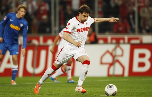 Cologne&#039;s Patrick Helmes scores a penalty against Bochum during the German second division Bundesliga soccer match in Cologne April 21, 2014. REUTERS/Ina Fassbender (GERMANY - Tags: SPORT SOCCER) ...