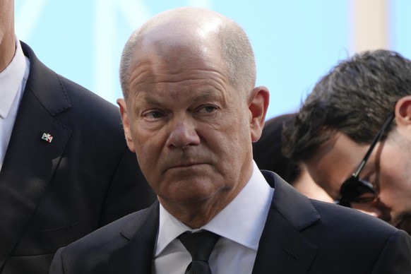 German Chancellor Olaf Scholz attends a wreath laying ceremony for the victims of a knife attack that killed three people last week, in Solingen, Germany, Sunday, Sept. 1, 2024. (AP Photo/Michael Prob ...