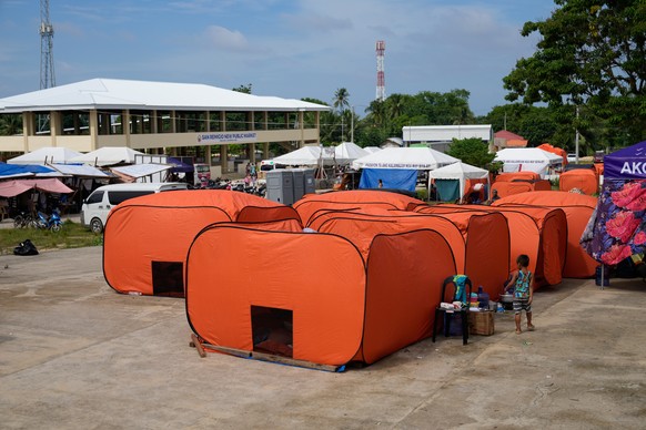 Earthquake survivors stay in tents on Thursday, Oct. 2, 2025, days after a strong quake struck in San Remigio, Cebu Province, Central Philippines. (AP Photo/Aaron Favila)
Philippines Earthquake