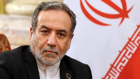 FILE - Iranian Foreign Minister Abbas Araghchi looks on during a meeting with Director General of the International Atomic Energy Agency (IAEA) Rafael Grossi, and Egyptian Foreign Minister Badr Abdela ...