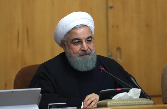 epa06411540 A handout photo made available by the presidential official website shows, Iranian President Hassan Rouhani speaks during a cabinet meeting in Tehran, Iran, 31 December 2017. Media reporte ...