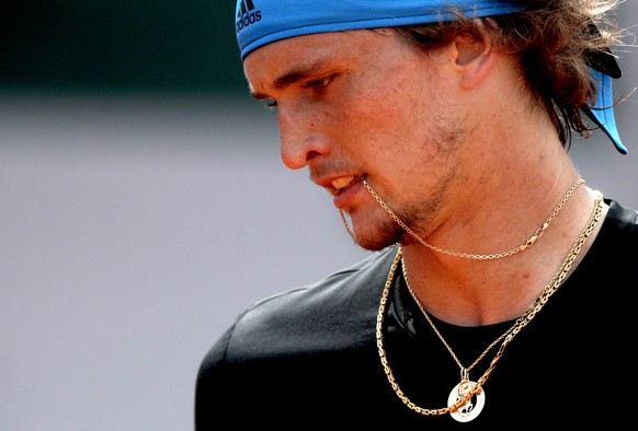 epa07622602 Alexander Zverev of Germany plays Fabio Fognini of Italy during their menâs round of 16 match during the French Open tennis tournament at Roland Garros in Paris, France, 03 June 2019. EP ...