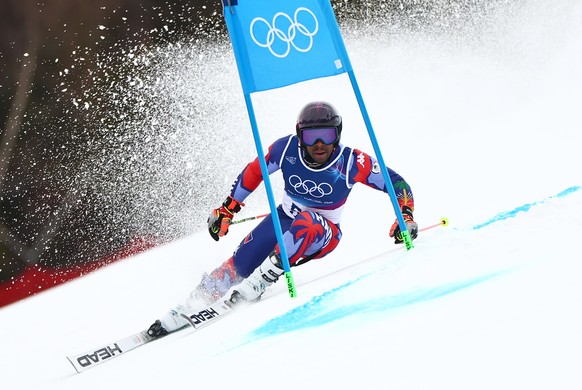 epa12737675 Richardson Viano of Haiti competes in the Men's Giant Slalom of the Alpine Skiing competitions at the Milano Cortina 2026 Winter Olympic Games, Stelvio ski centre in Bormio, Italy, 14 ...