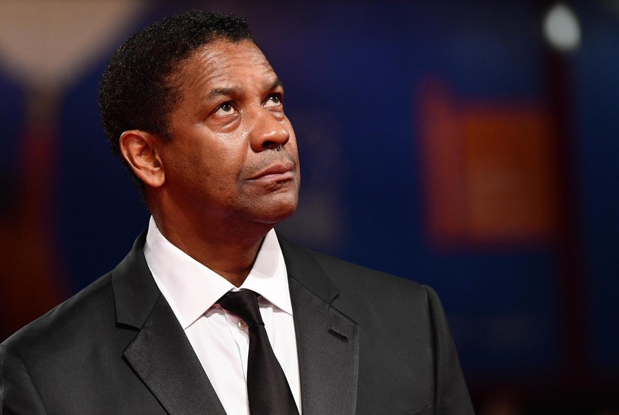 US actor Denzel Washington arrives for the screening of The magnificent Seven, at the 73rd Venice International Film Festival, in Venice, Italy, Saturday, Sept. 10, 2016. (Ettore Ferrari/ANSA via AP)