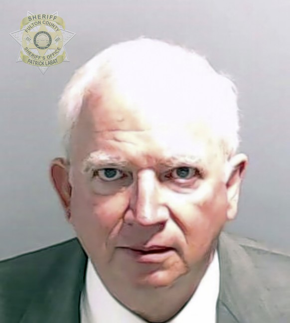 This booking photo provided by the Fulton County Sheriff&#039;s Office shows John Eastman on Tuesday, Aug. 22, 2023, in Atlanta, after he surrendered and was booked. Eastman is charged alongside forme ...