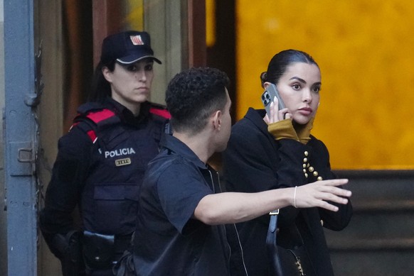 epa11132014 Joana Sanz (R), former wife of former FC Barcelona&#039;s Brazilian player Dani Alves leaves after the second day of the trial against Alves at Barcelona&#039;s Court in Barcelona, Catalon ...