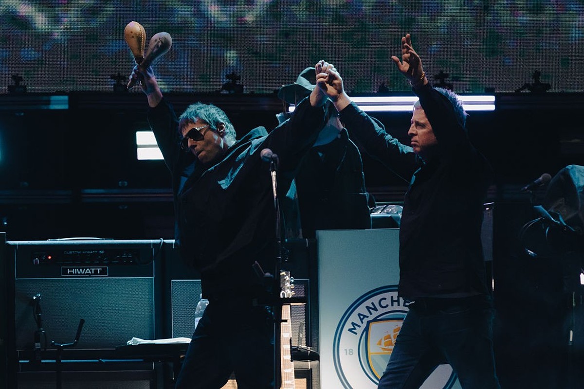 SYDNEY, AUSTRALIA - NOVEMBER 07 2025: Liam and Noel Gallagher of British band Oasis walk together on stage to perform as part of their Live '25 global tour in Sydney Australia (Photo credit shoul ...