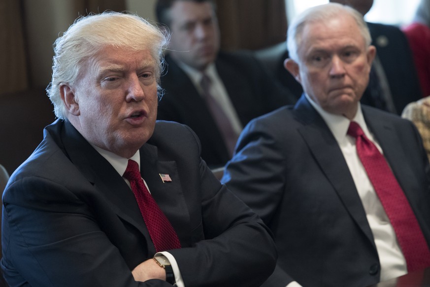 epa06108938 (FILE) - US President Donald J. Trump (L), with Attorney General Jeff Sessions (R),
delivers remarks during an opioid and drug abuse listening session in the Roosevelt Room of the White H ...