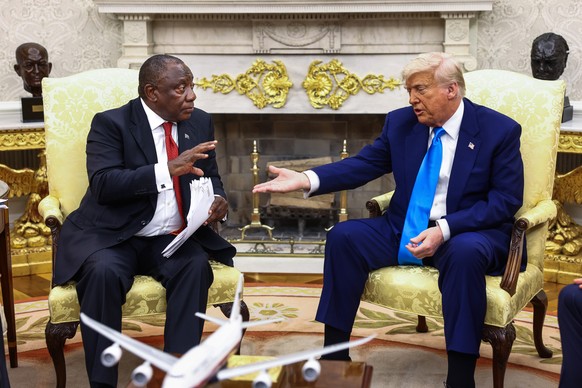 epa12123573 US President Donald Trump (R) meets with South Africa?s President Cyril Ramaphosa (L) in the Oval Office of the White House in Washington, DC, USA, 21 May 2025. Ramaphosa?s visit comes one ...