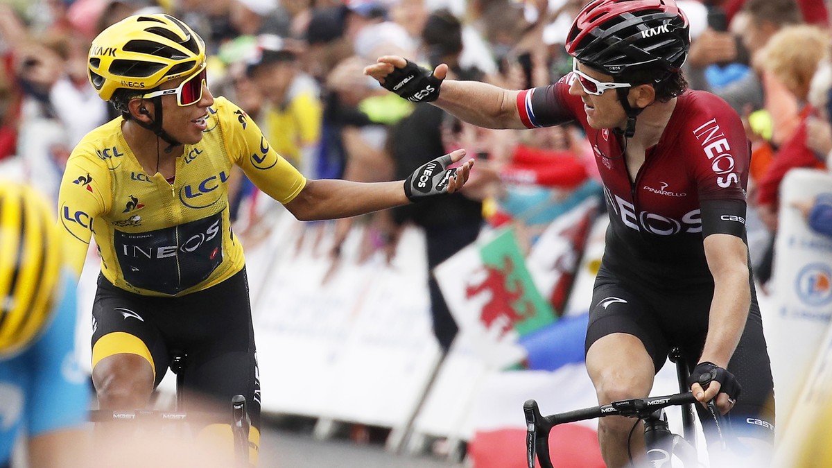 epa07744408 Colombia's Egan Bernal (L) of Team Ineos is congratulated by his British teammate Geraint Thomas (R) after retaining the overall leader's yellow jersey in the 20th stage of the 1 ...