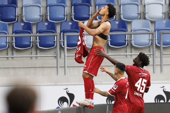 Winterthur&#039;s midfielder Sayfallah Ltaief, left, celebrates his goal with his teammates Winterthur&#039;s midfielder Musa Araz, centre, and Winterthur&#039;s midfielder Alexandre Jankewitz, right, ...