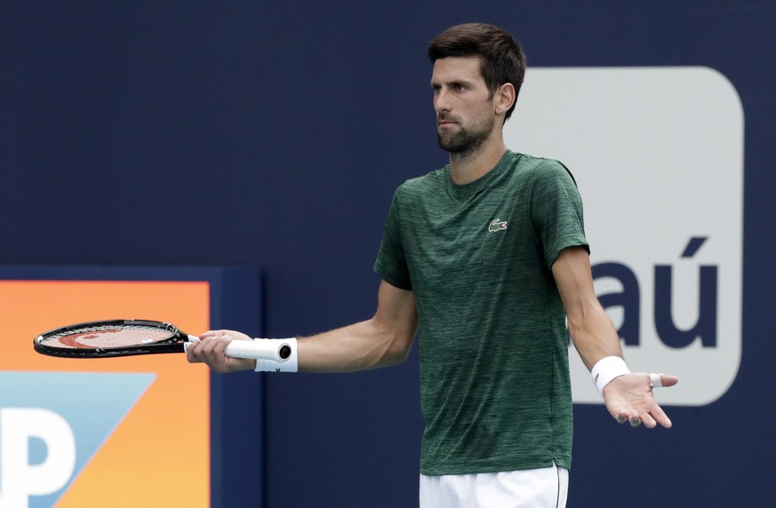 epa07447469 Novak Djokovic of Serbia warms up prior to his upcoming matches at the Miami Open tennis tournament in Miami, Florida, USA, 18 March 2019. EPA/JASON SZENES