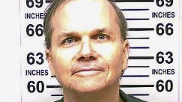 FILE- This Jan. 31, 2018 photo, provided by the New York State Department of Corrections, shows Mark David Chapman, the man who killed John Lennon on Dec. 8, 1980. The New York State Parole Board has  ...