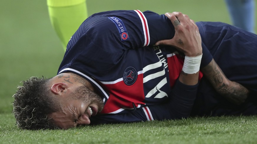 PSG&#039;s Neymar holds his arm during the Champions League semifinal first leg soccer match between Paris Saint Germain and Manchester City at the Parc des Princes stadium, in Paris, France , Wednesd ...