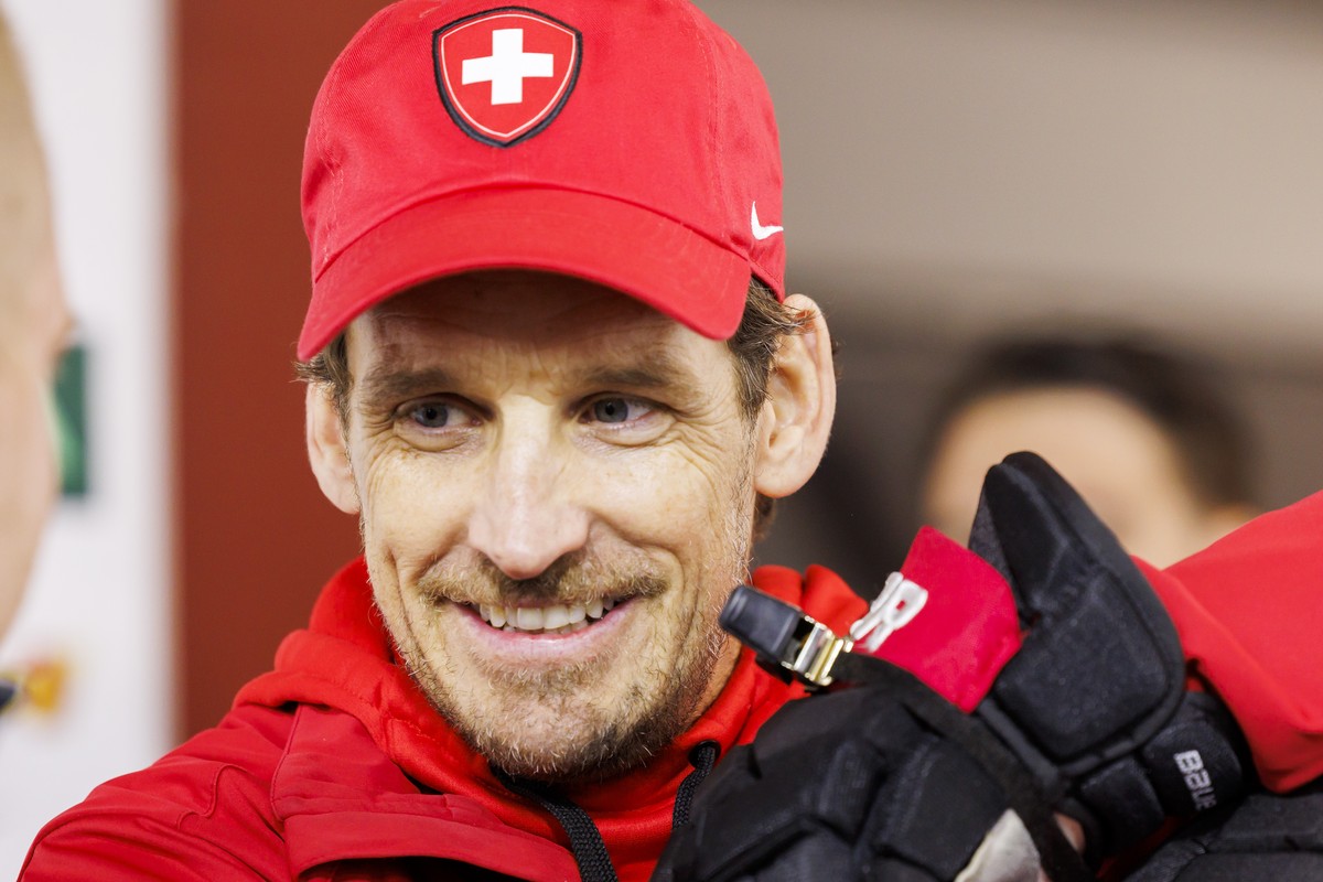Patrick Fischer, head coach of Switzerland national ice hockey team, talks to reporters, after a Switzerland team training session at the IIHF 2023 World Championship, at the Riga Arena, in Riga, Latv ...