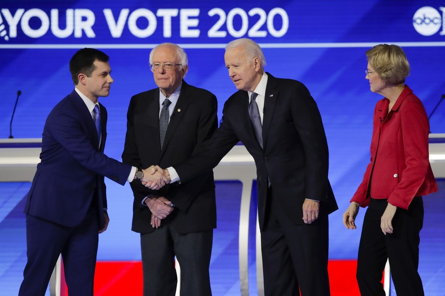 From left, Democratic presidential candidates former South Bend Mayor Pete Buttigieg, Sen. Bernie Sanders, I-Vt., former Vice President Joe Biden, and Sen. Elizabeth Warren, D-Mass., on stage Friday,  ...