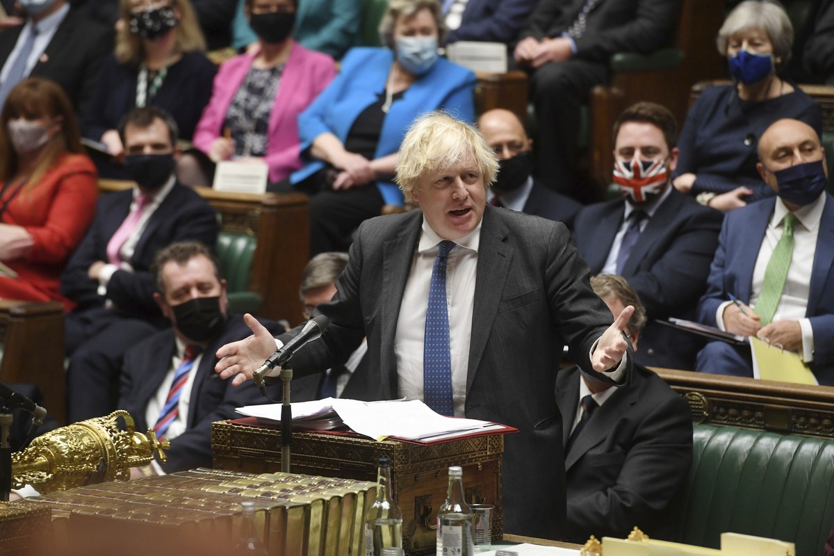 In this photo issued by UK Parliament, Britain's Prime Minister Boris Johnson speaks during Prime Minister's Questions in the House of Commons, London, Wednesday Dec. 15, 2021. (Jessica Tayl ...