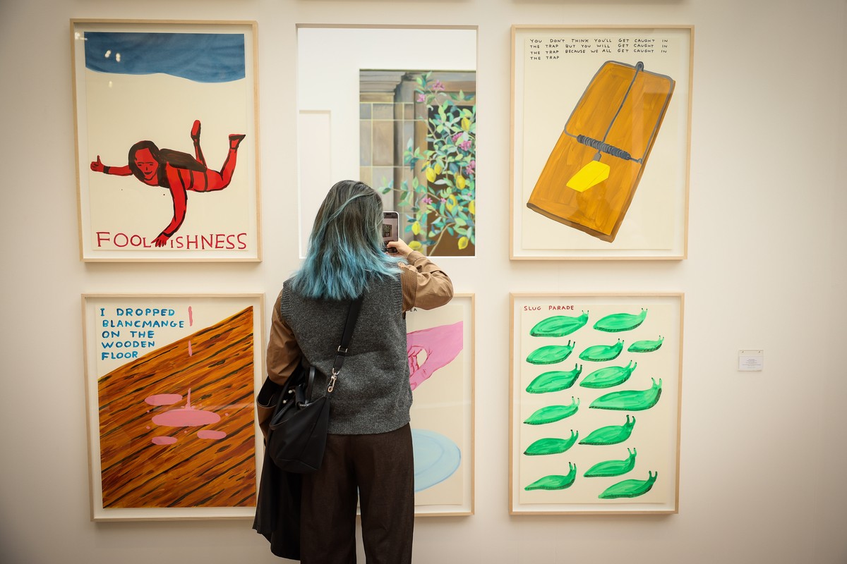 A visitor attends the public opening day of the Art Basel art fair, Saturday, Oct. 25, 2025 in Paris. (AP Photo/Thomas Padilla)
France Paris Art Basel