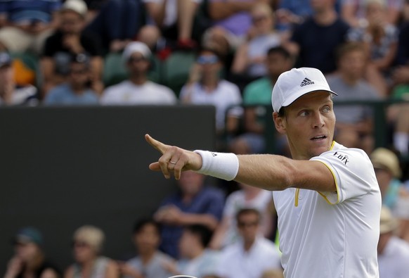 Czech Republic&#039;s Tomas Berdych gestures as he plays Austria&#039;s Dominic Thiem during their Men&#039;s Singles Match on day seven at the Wimbledon Tennis Championships in London Monday, July 10 ...