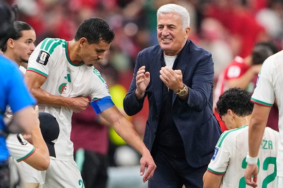 Algeria head coach Vladimir Petkovic gestures to his players in the hydration break during the World Cup round of 32 soccer match between Switzerland and Algeria in Vancouver, British Columbia, Thursd ...