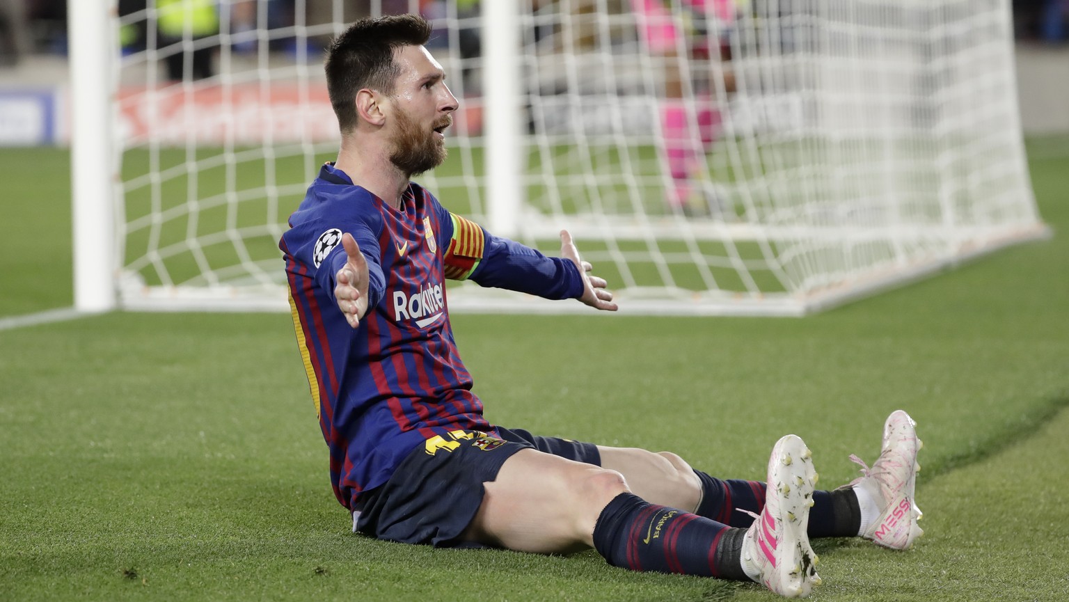 Barcelona's Lionel Messi celebrates after scoring his side's third goal during the Champions League semifinal, first leg, soccer match between FC Barcelona and Liverpool at the Camp Nou stadium in Bar ...
