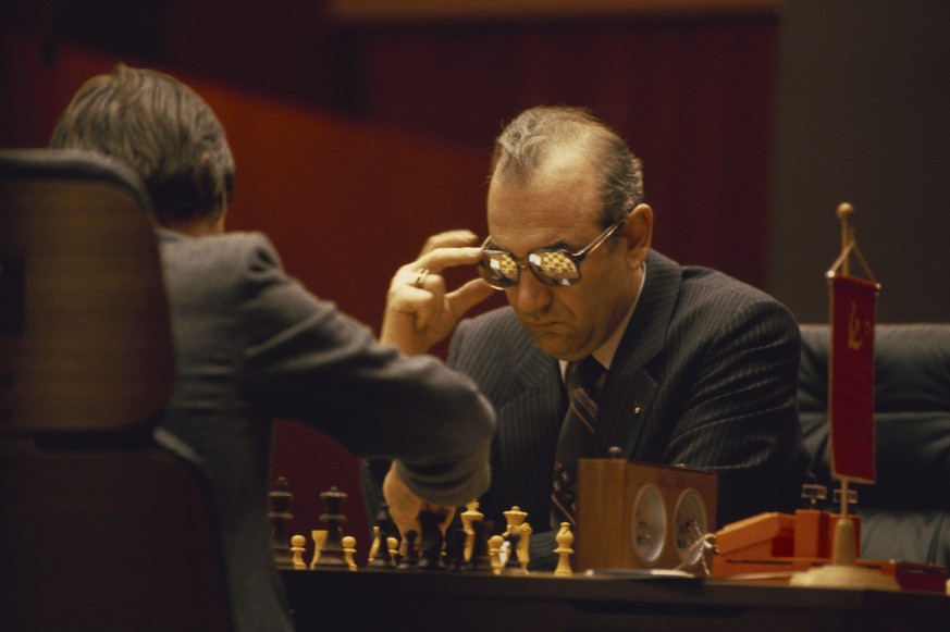 Viktor Korchnoi watches as Anatoly Karpov makes a move during the World Chess Championships. Karpov would go on to win the tournament, easily defeating Korchnoi, 11-7, in what became known as the Mass ...