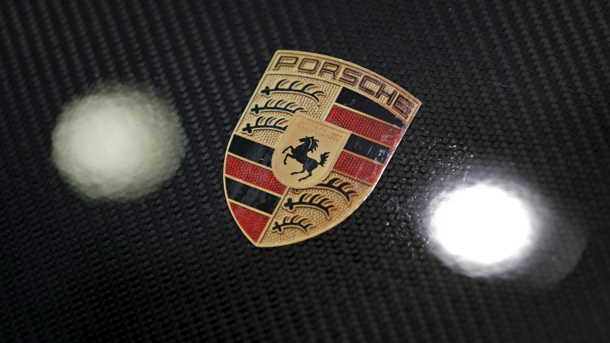epa06607488 A Porsche Logo on a bonnet of a Porsche sports car prior to the annual results press conference of Porsche AG in Stuttgart, Germany, 16 March 2018. Porsche AG during the conference will pr ...