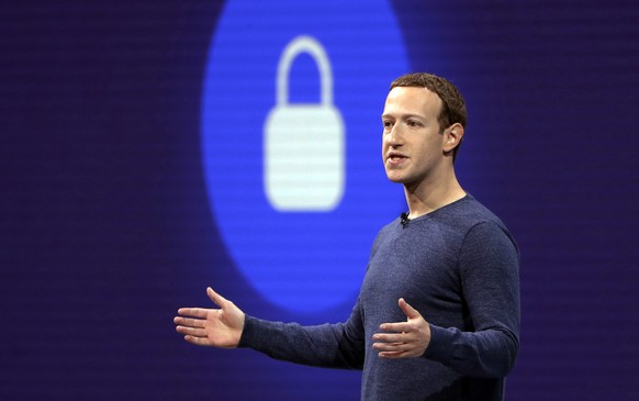 FILE - In this May 1, 2018, file photo, Facebook CEO Mark Zuckerberg delivers the keynote speech at F8, Facebook&#039;s developer conference, in San Jose, Calif. Federal regulators are fining Facebook ...