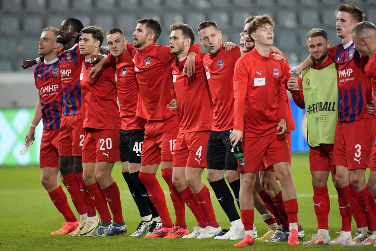 Heidenheim's players celebrate after the end of the Europa Conference League opening phase soccer match between Pafos and Heidenheim, at Alpha Mega stadium in Limassol, Cyprus, Thursday, Oct. 24, ...