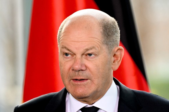 epa10403035 German Chancellor Olaf Scholz speaks during a press conference with Iraqi prime minister at the Chancellery in Berlin, Germany, 13 January 2023. The Iraqi prime minister is on an official  ...