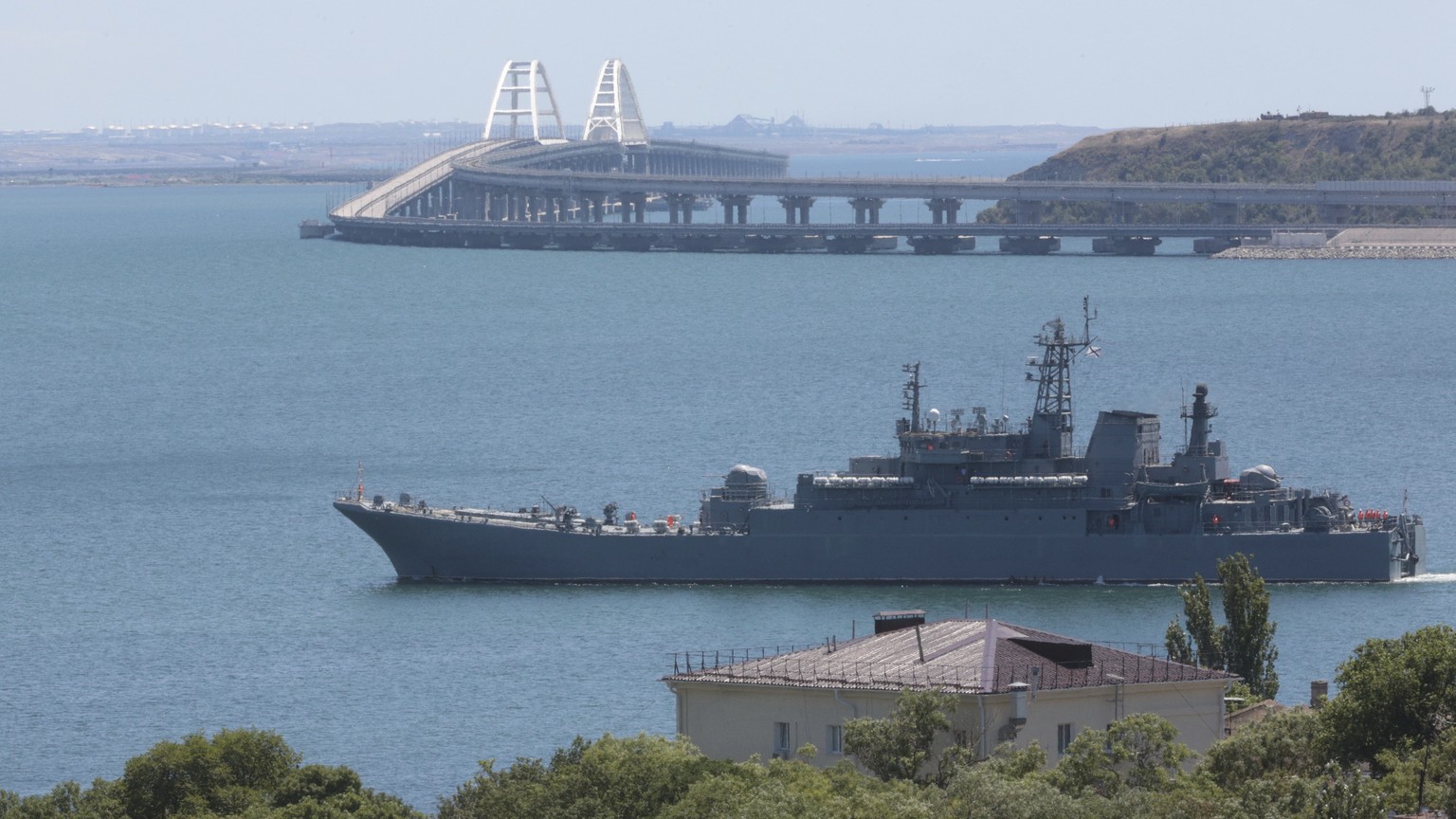 FILE - A Russian military landing ship, which now transports cars and people between Crimea and Taman because the Crimean Bridge connecting Russian mainland and Crimean peninsula over the Kerch Strait ...