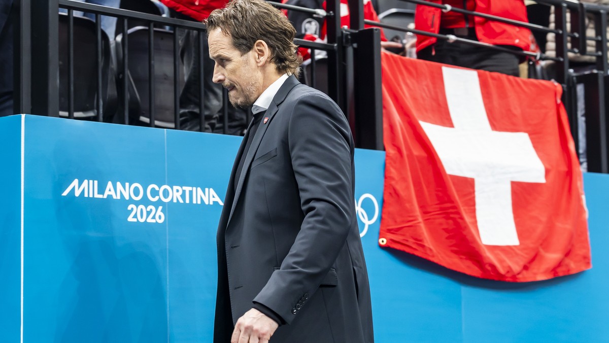 Patrick Fischer, head coach of Switzerland national ice hockey team, looks disappointed as they leave his bench after the second period, during the men's group A preliminary round game between Ca ...