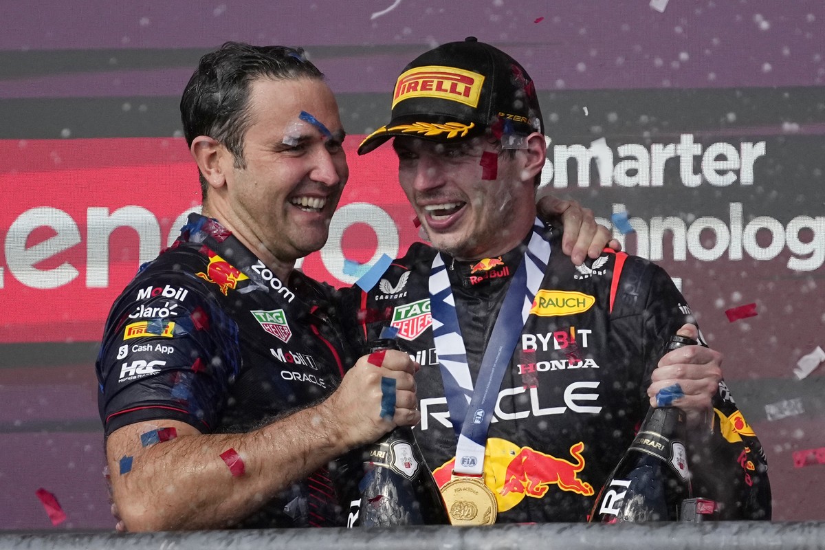 Red Bull driver Max Verstappen, of the Netherlands, right, celebrates on the podium after winning the Formula One U.S. Grand Prix auto race at Circuit of the Americas, Sunday, Oct. 22, 2023, in Austin ...