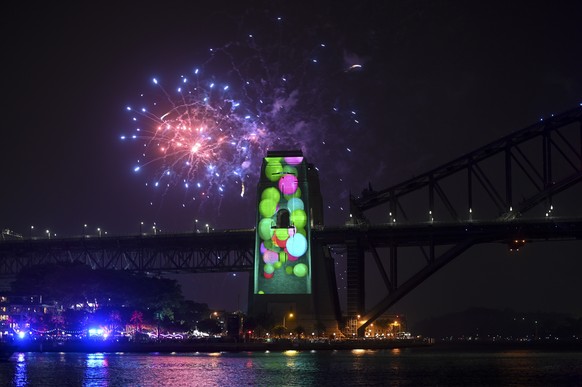 epa08095789 Fireworks explode over Sydney Harbour during the Family Fireworks as part of New Year&#039;s Eve celebrations in Sydney, Australia, 31 December 2019. The smaller firework is launched at 9p ...