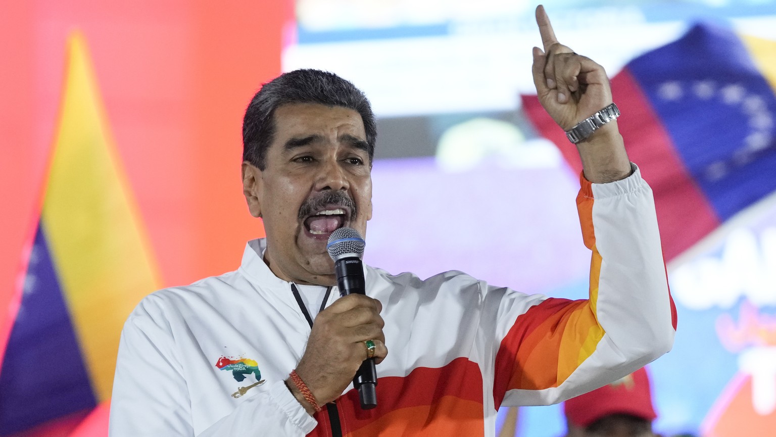 President Nicolas Maduro speaks to pro-government supporters after a referendum regarding Venezuela&#039;s claim to the Essequibo, a region administered and controlled by Guyana, in Caracas, Venezuela ...