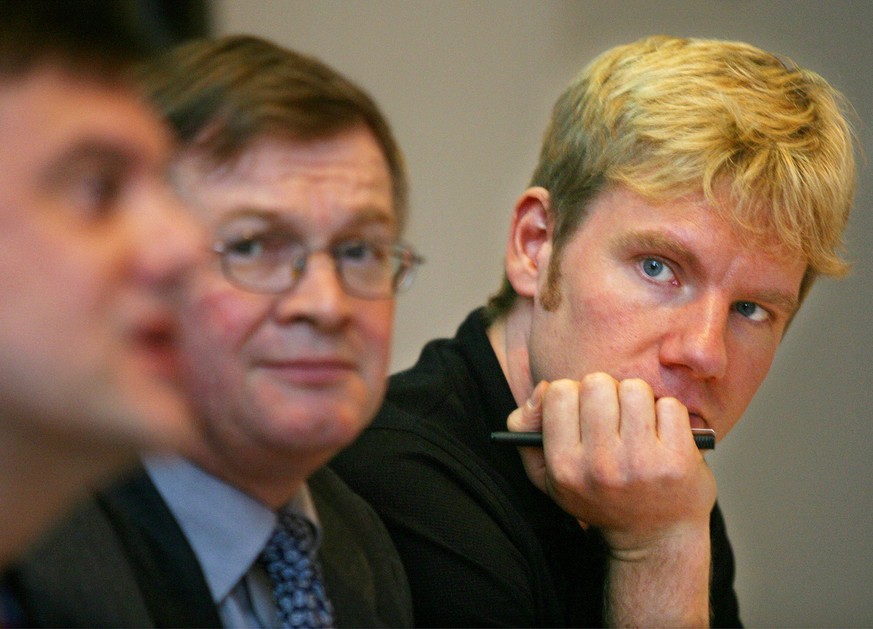 Bjorn Lomborg, right, and Ole P Kristensen, listen as Clive Crook, Deputy Editor of the Economist, speaks during the Copenhagen Consensus press conference Tuesday Jan. 13, 2004 in Copenhagen, Denmark. ...