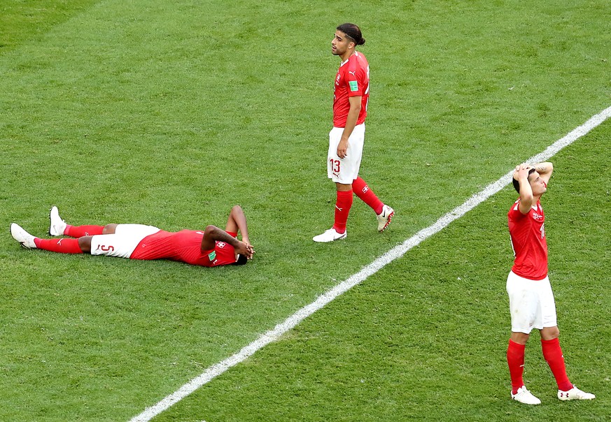 epa06861414 Players of Switzerland react after the FIFA World Cup 2018 round of 16 soccer match between Sweden and Switzerland in St.Petersburg, Russia, 03 July 2018.

(RESTRICTIONS APPLY: Editorial ...