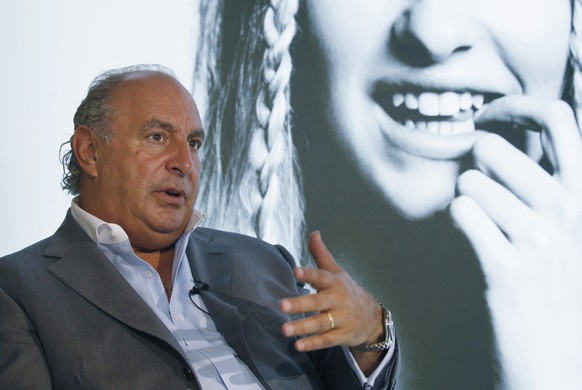 FILE - In this file photo dated Wednesday, June 5, 2013, Philip Green speaks during an interview at his new Topshop store in Hong Kong. British politician Peter Hain has used British Parliament&#039;s ...