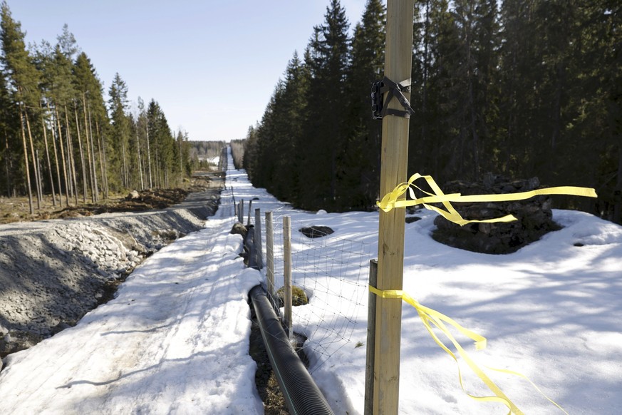 The construction site of the Finland-Russian eastern border fence at the Pelkola border crossing in Imatra, Southeast Finland, Friday, April 14, 2023. In Pelkola, construction of a trial fence ...