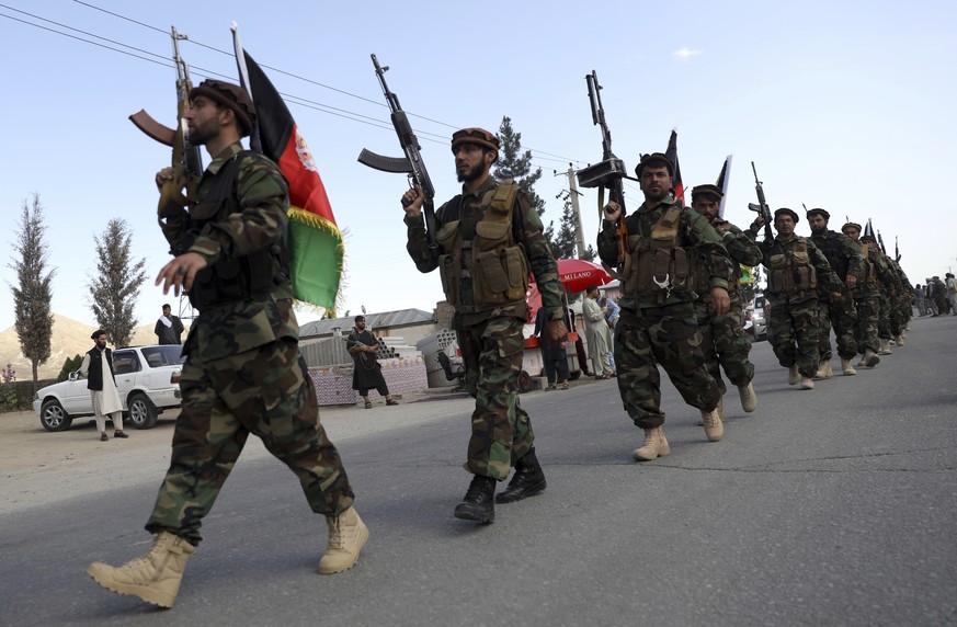 Afghan militiamen join Afghan defense and security forces during a gathering in Kabul, Afghanistan, Wednesday, June 23, 2021. Taliban gains in north Afghanistan, the traditional stronghold of the coun ...