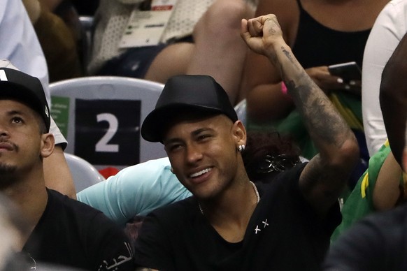 Brazil's Neymar cheers during a men's gold medal volleyball match between Brazil and Italy at the 2016 Summer Olympics in Rio de Janeiro, Brazil, Sunday, Aug. 21, 2016. (AP Photo/Matt Rourke)