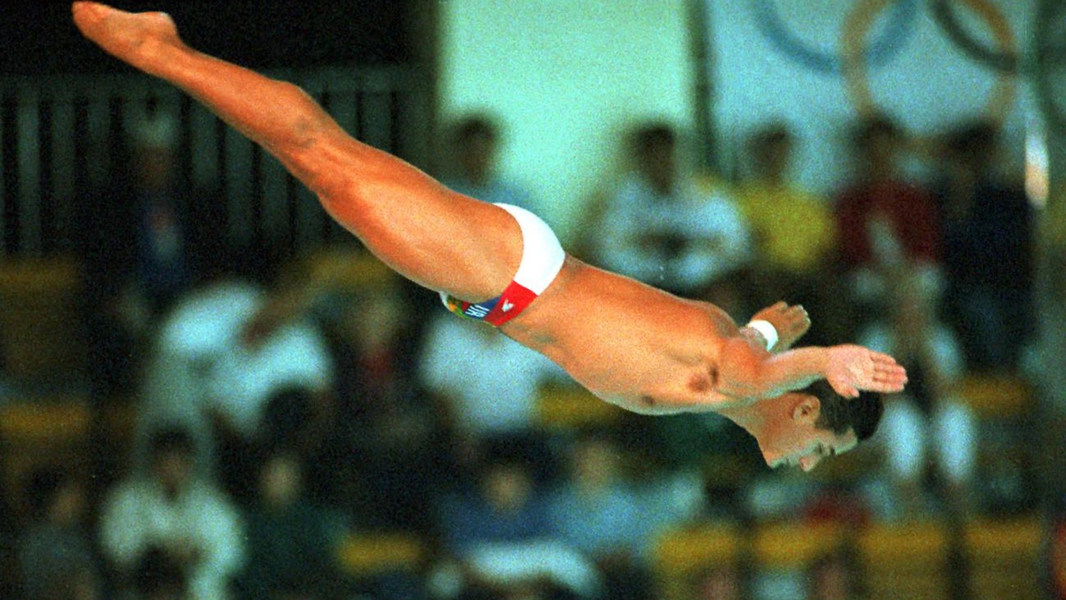 FILE - In this Sept. 26, 1988, file photo, Greg Louganis, of the United States, performs in the men&#039;s preliminary 10-meter platform diving competition at the XXIV Summer Olympic Games in Seoul, S ...