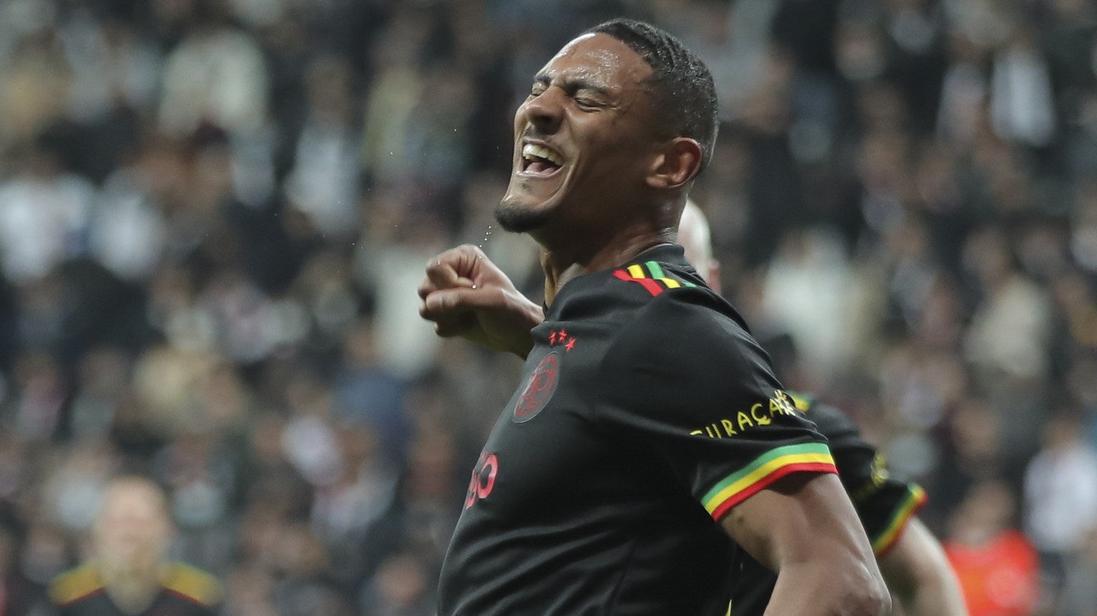 Ajax&#039;s Sebastien Haller celebrates scoring his side&#039;s second goal during the Champions League group C soccer match between Besiktas and Ajax at the Vodafone Park Stadium in Istanbul, Turkey, ...