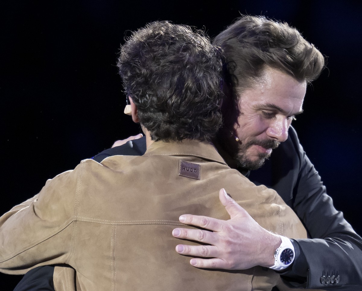 Bastian Baker, left, and Stan Wawrinka, right, during his farewell ceremony at the Swiss Indoors tennis tournament at the St. Jakobshalle in Basel, Switzerland, on Monday, October 26, 2026. (KEYSTONE/ ...