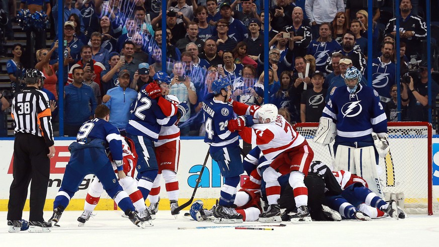Apr 15, 2016; Tampa, FL, USA; Tampa Bay Lightning and Detroit Red Wings fight with less then one minute left during the third period of the game two of the first round of the 2016 Stanley Cup Playoffs ...