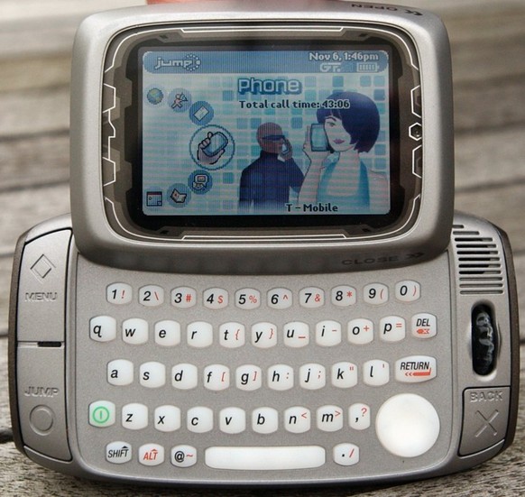 The T-Mobile Sidekick is shown Nov. 6, 2003 in Providence, R.I. Cell phone-sized gadgets like the BlackBerry and the T-Mobile Sidekick have caught on quickly with the deaf, giving them freedom to move ...